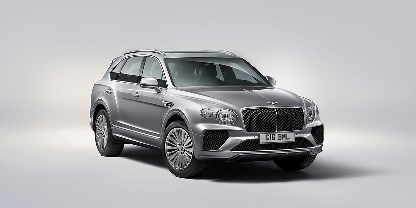 Bentley Jeddah Bentley Bentayga luxury SUV front three quarter view in Moonbeam paint with matrix grille and 21″ 5 spoke painted wheels
