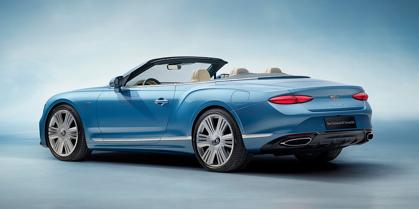Bentley Jeddah New Bentley Continental GTC Azure convertible rear view in Light Windsor blue paint with 22 inch ten spoke wheels and chrome exterior details