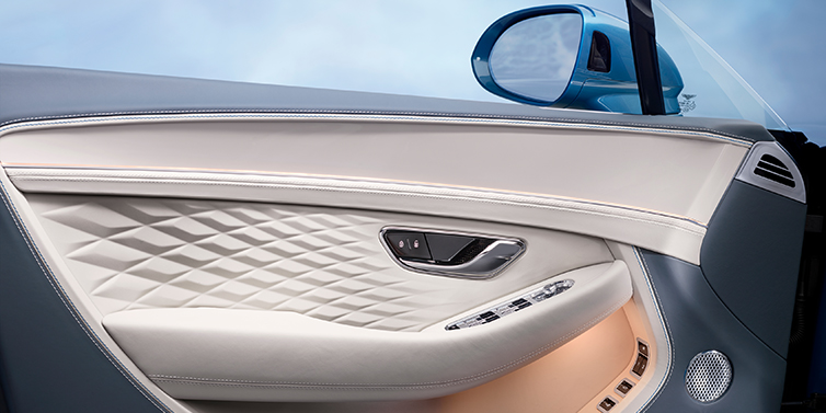 Bentley Jeddah New Bentley Continental GT Azure coupe door interior featuring Linen and Brunel hides and Piano Linen veneer